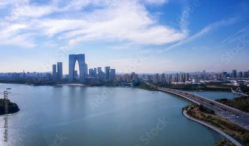 Aerial photography of the panoramic view of the city by Jinji Lake in Suzhou © 昊 周