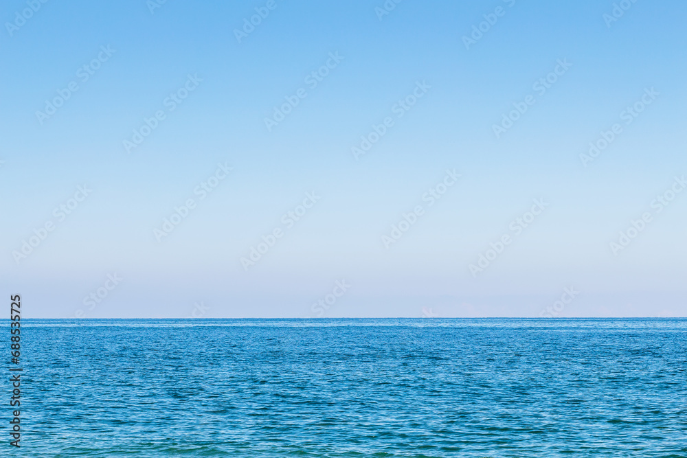 travel to Georgia - clear blue sky over surface of Black Sea from Batumi city on sunny autumn day