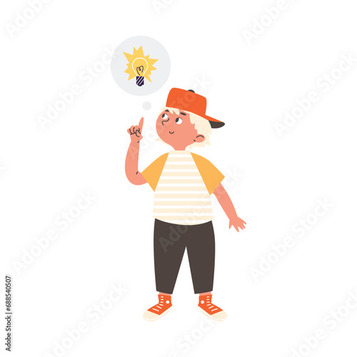 Cute smiling kid boy having idea and points finger up to bulb
