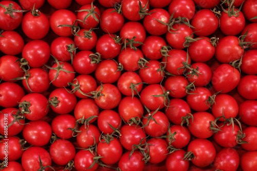 Many fresh ripe tomatoes as background, top view © New Africa