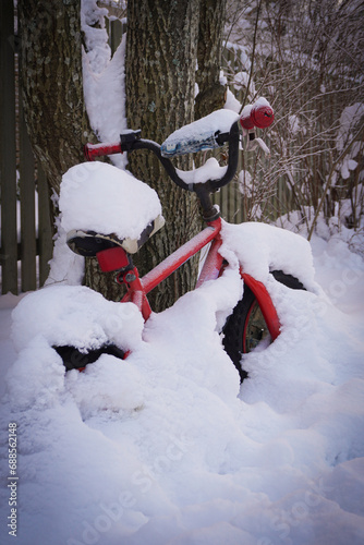 Close-up of snow covered bicycle