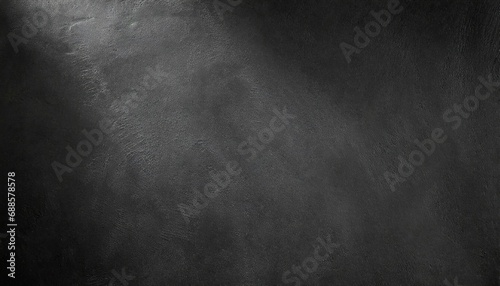 black wall rough texture background concrete floor or old grunge backdrop illuminated by sun ray close up of dark graphite surface for modern background design concept of textures and background © Robert