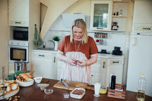Woman cook at home in kitchen preparing delicious food
