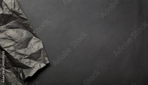 scrunched black paper background photo