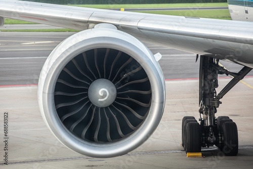 Closeup of a huge jet engine of a commercial jetliner © Wirestock