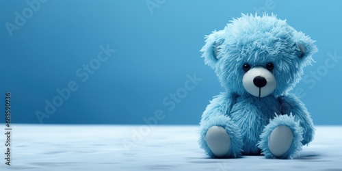sad blue teddy bear, on a blue background, blue monday, copy space, banner