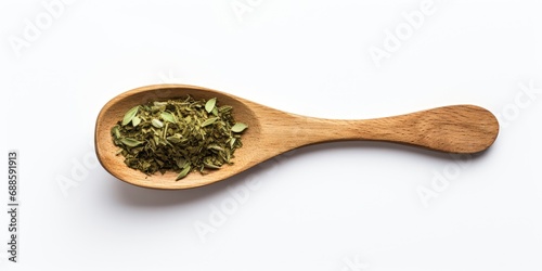 Dried Basil In Wooden Spoon On White Background. Green Herbal Seasoning. Dry Crushed Oregano. Spice Condiment, Top View Of Natural Condiment.