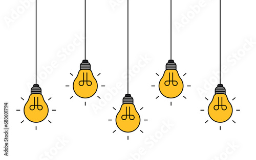 Hanging light bulbs glowing on white background. Concept of idea photo