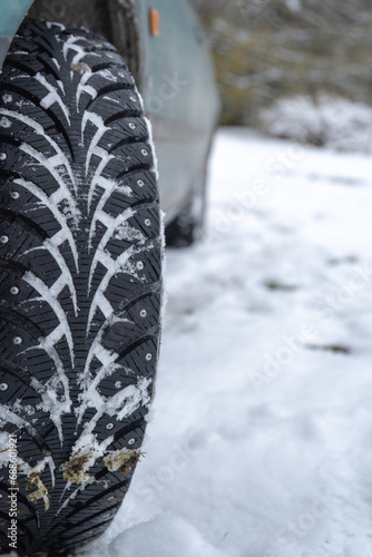 close up of snowy winter tire © Joose