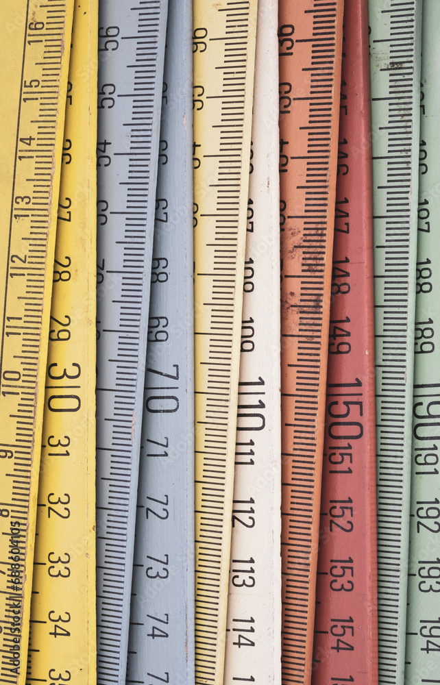 Old wooden folding meter ruler measuring centimeters Old wooden folding meter ruler measuring centimeters