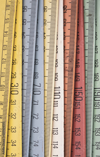 Old wooden folding meter ruler measuring centimeters