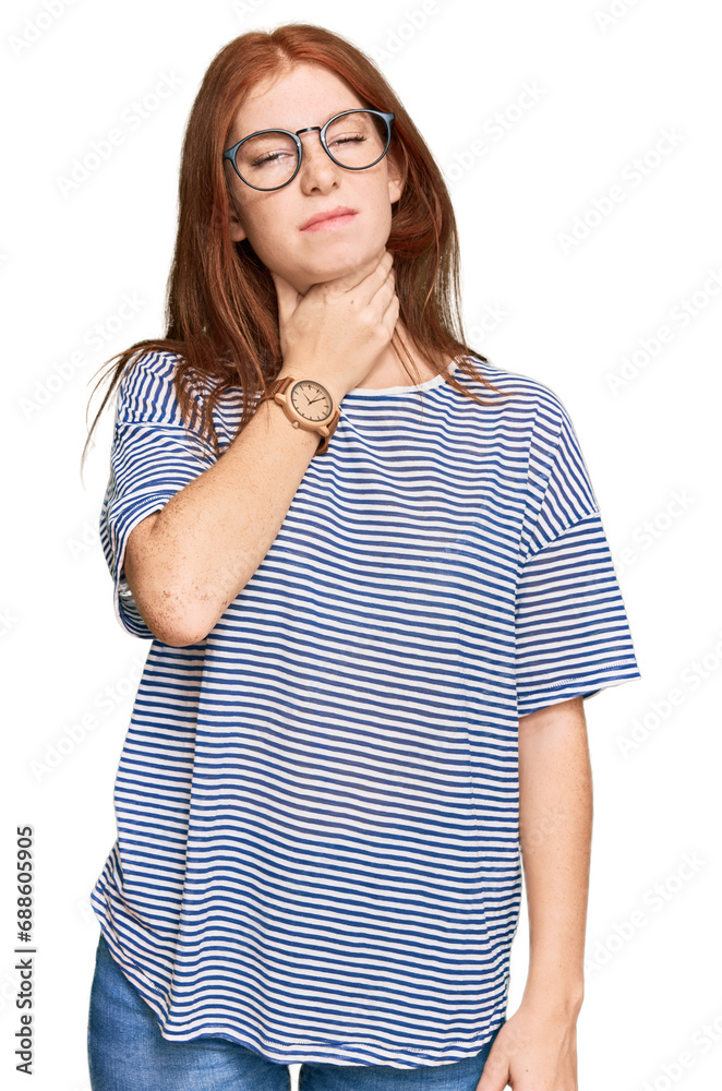 Young read head woman wearing casual clothes and glasses touching painful neck, sore throat for flu, clod and infection