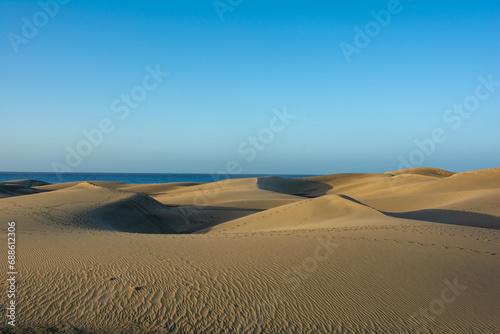 Sand dunes with a view to the sea