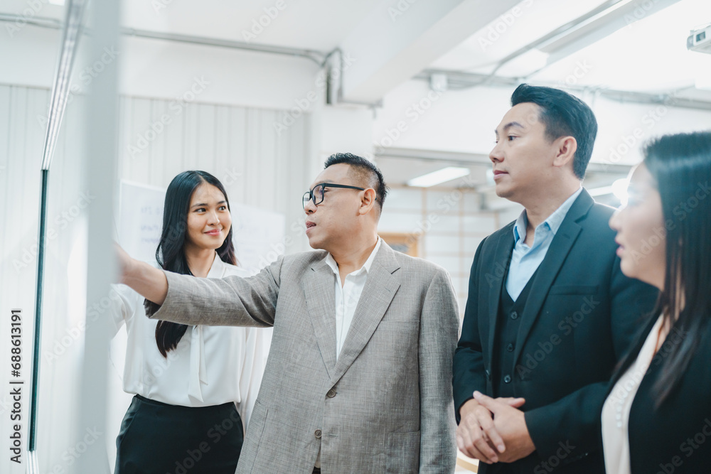 Professional diverse business people having collaboration team meeting in an office, technology and workers, men or employees with touchscreen planning sales, research or financial strategy in company