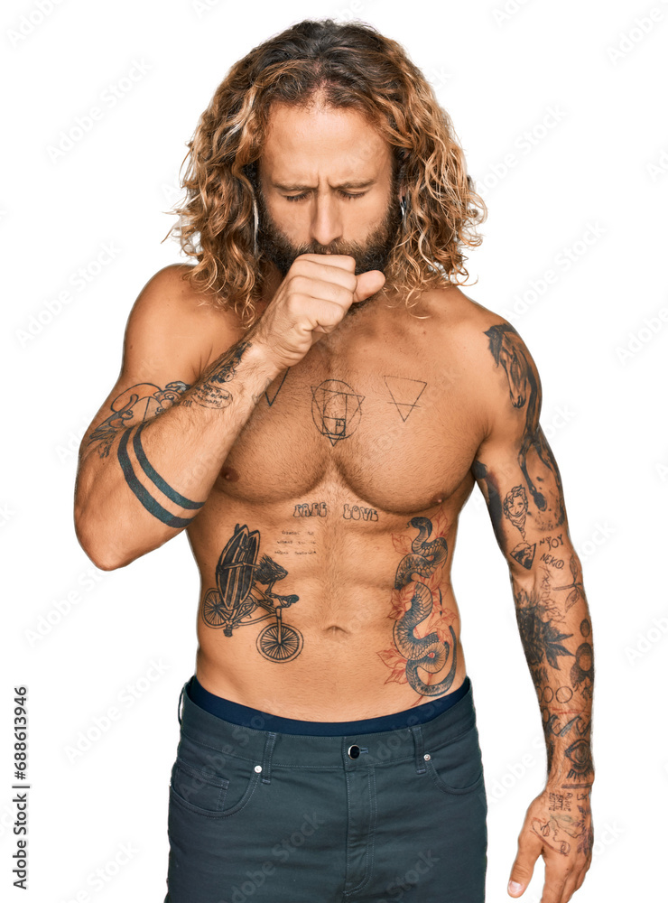Fototapeta premium Handsome man with beard and long hair standing shirtless showing tattoos feeling unwell and coughing as symptom for cold or bronchitis. health care concept.