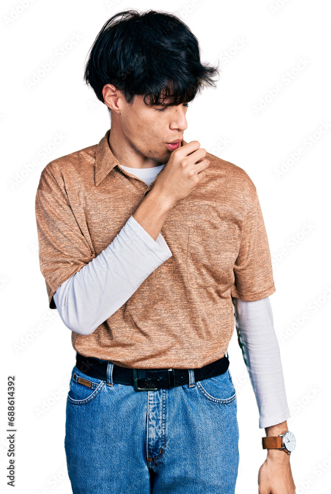 Handsome hipster young man wearing 90s retro style feeling unwell and coughing as symptom for cold or bronchitis. health care concept. Handsome hipster young man wearing 90s retro style feeling unwell and coughing as symptom for cold or bronchitis. health care concept.