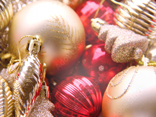 Many shiny golden baubles and red baubles image for Christmas and New Year celebrations