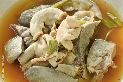 boiled hot and spicy soup with pork entrails on plate