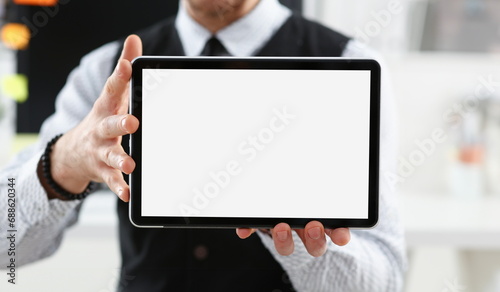 Male arm show tablet pc screen to camera closeup. Stock market student management time chat addict electronic bank modern lifestyle job plan share blog tweet mania news web application