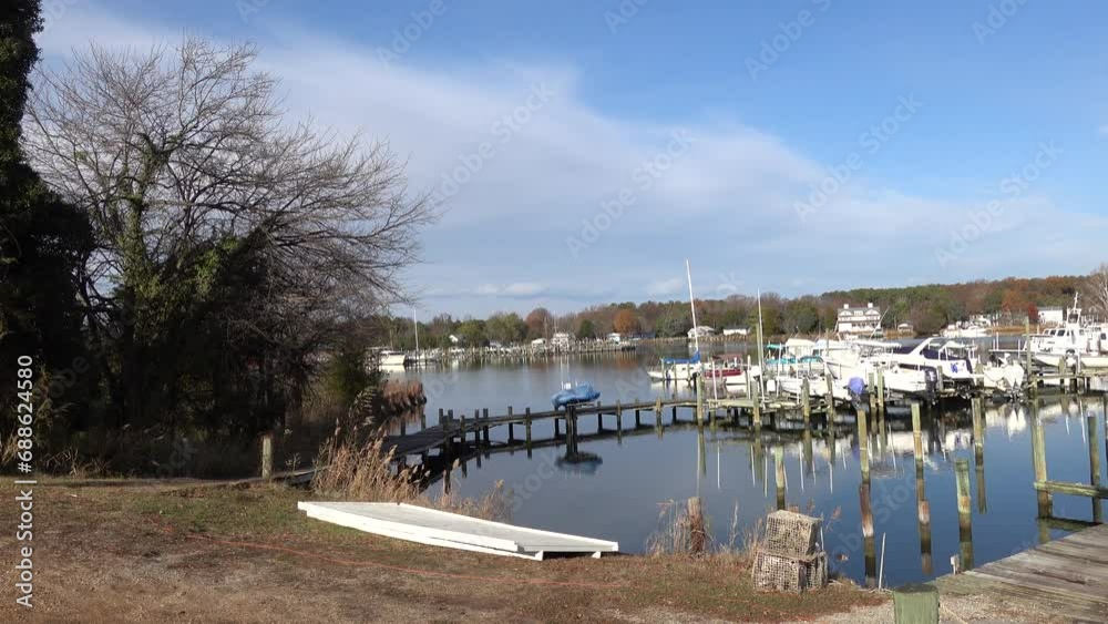 Cobb Island, Maryland USA A small marina with boats on the Potomac River. Cobb Island, Maryland USA A small marina with boats on the Potomac River.