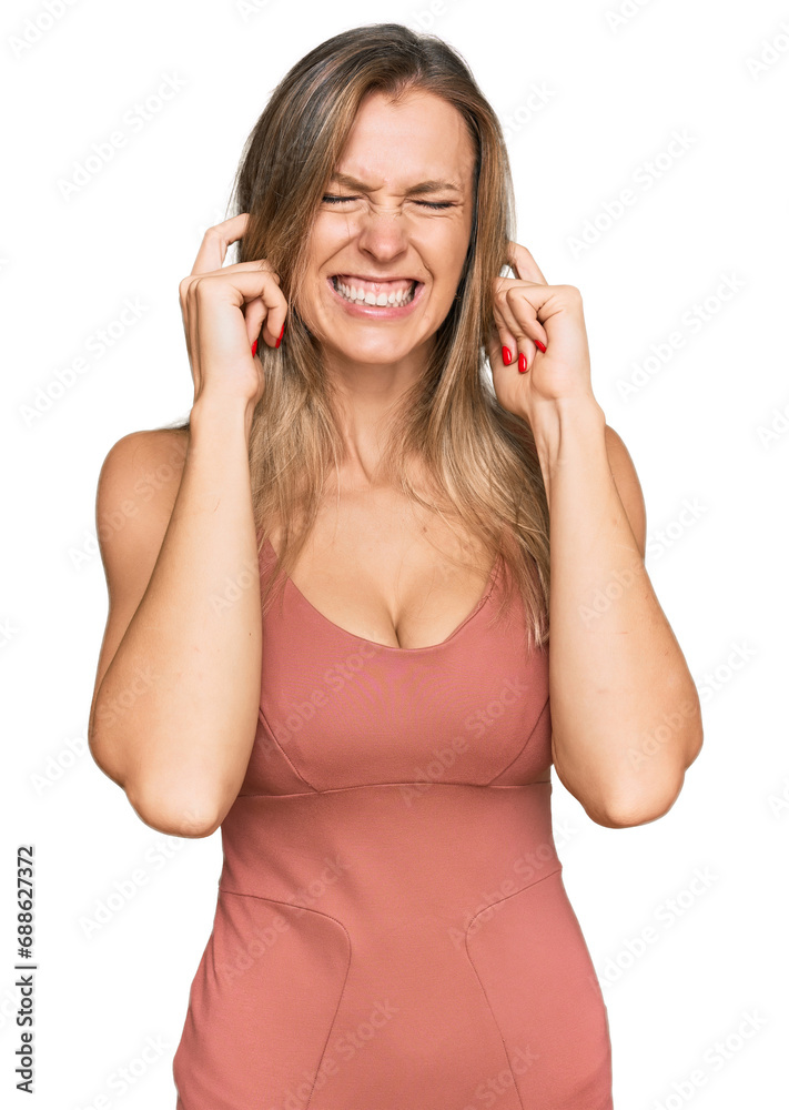 Beautiful caucasian woman wearing casual clothes covering ears with fingers with annoyed expression for the noise of loud music. deaf concept. Beautiful caucasian woman wearing casual clothes covering ears with fingers with annoyed expression for the noise of loud music. deaf concept.