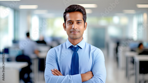 Smiling Indian Businessman On Blurred Office Background - legal AI