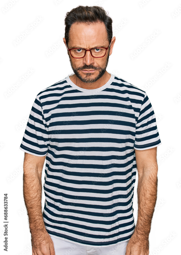 Middle age man wearing casual clothes and glasses skeptic and nervous, frowning upset because of problem. negative person. Middle age man wearing casual clothes and glasses skeptic and nervous, frowning upset because of problem. negative person.