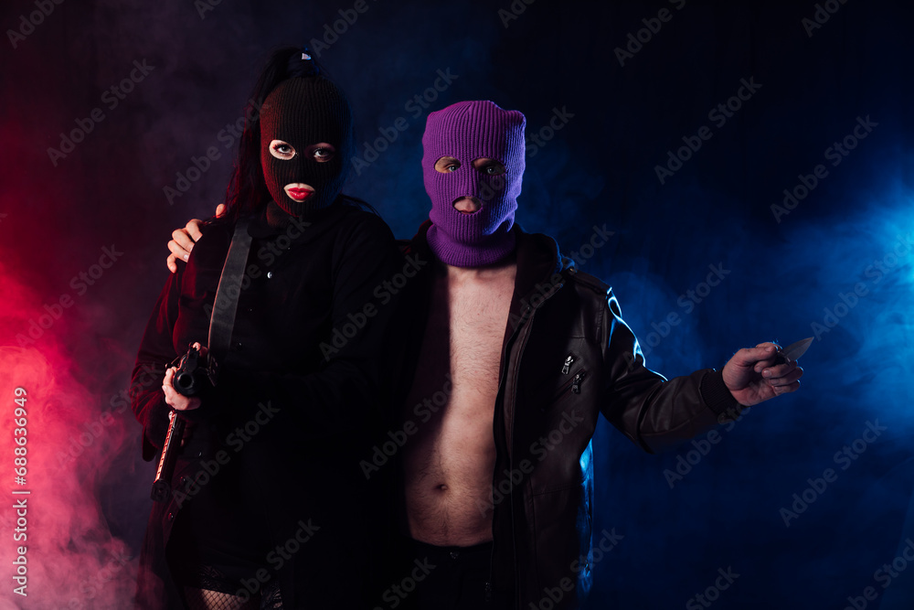 masked terrorists with weapons in the smoke