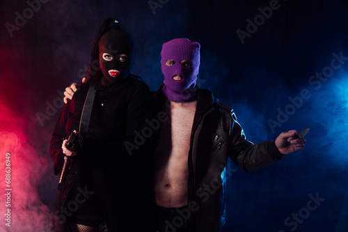 Fototapeta Naklejka Na Ścianę i Meble -  masked terrorists with weapons in the smoke