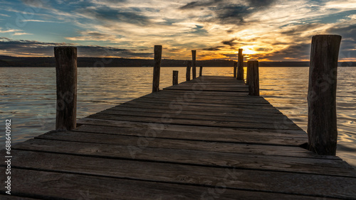 wooden pier at sunset