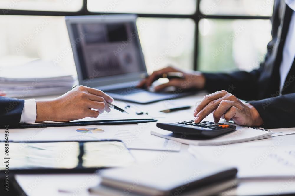 Business people meeting to discuss growth analysis of financial charts and business marketing graphs. Accounting, financial planning and investment. Business people meeting to discuss growth analysis of financial charts and business marketing graphs. Accounting, financial planning and investment.