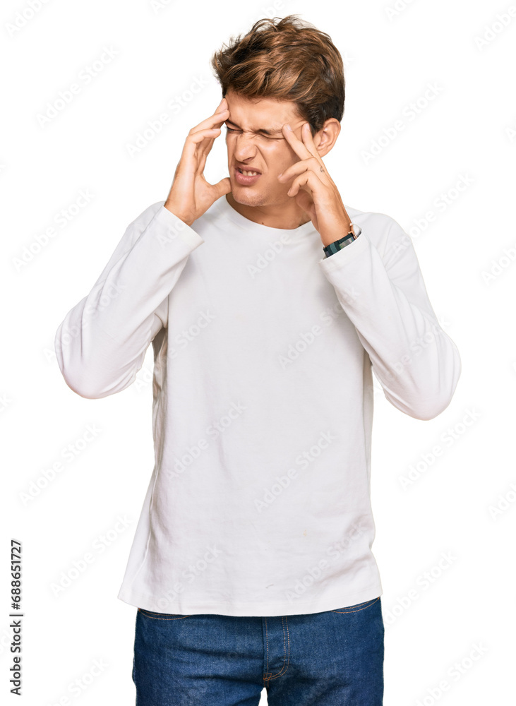 Handsome caucasian man wearing casual white sweater with hand on head, headache because stress. suffering migraine. Handsome caucasian man wearing casual white sweater with hand on head, headache because stress. suffering migraine.