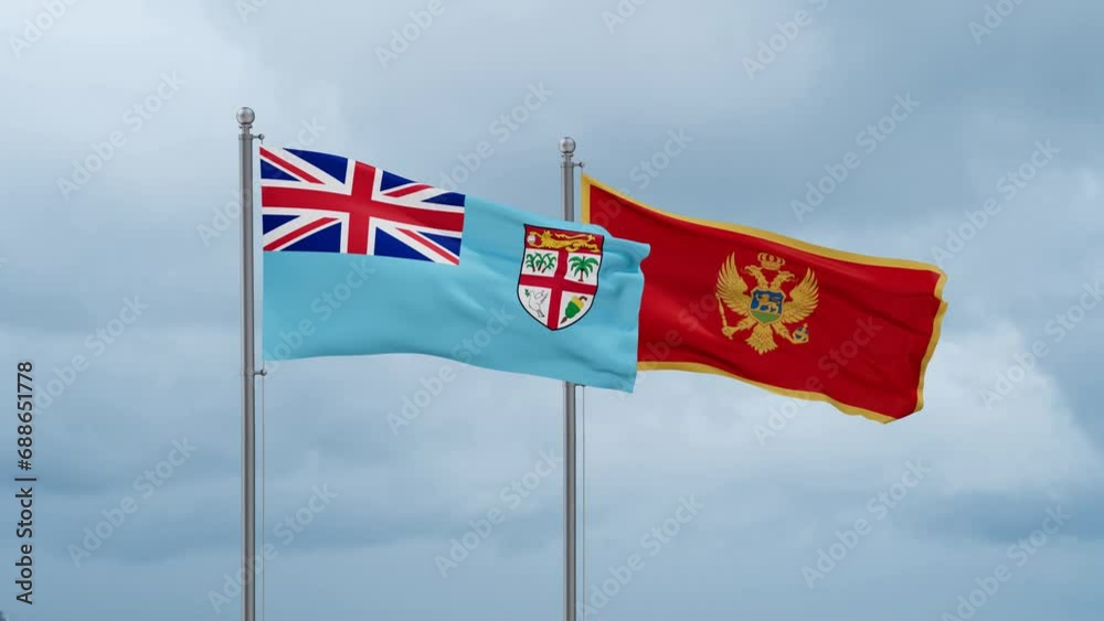 Montenegro and Fiji flag waving together on cloudy sky, endless seamless loop, two country cooperation concept Montenegro and Fiji flag waving together on cloudy sky, endless seamless loop, two country cooperation concept