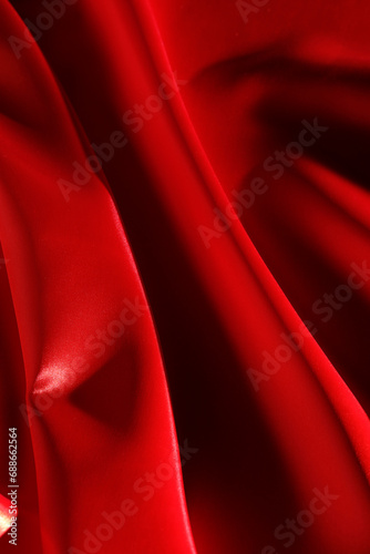 Background with red silk fabric.