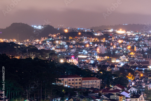 Wallpaper Mural View on roofs in the city of Dalat. Da Lat and the surrounding area is a popular tourist destination of Asia. City with fogs and mountains Torontodigital.ca