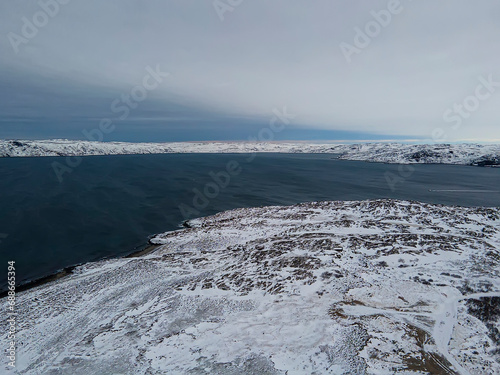 Wallpaper Mural Winter landscape with mountains and snow in a polar day, Arctic Ocean, the Barents Sea, settlement of Teriberka, Russia. Torontodigital.ca