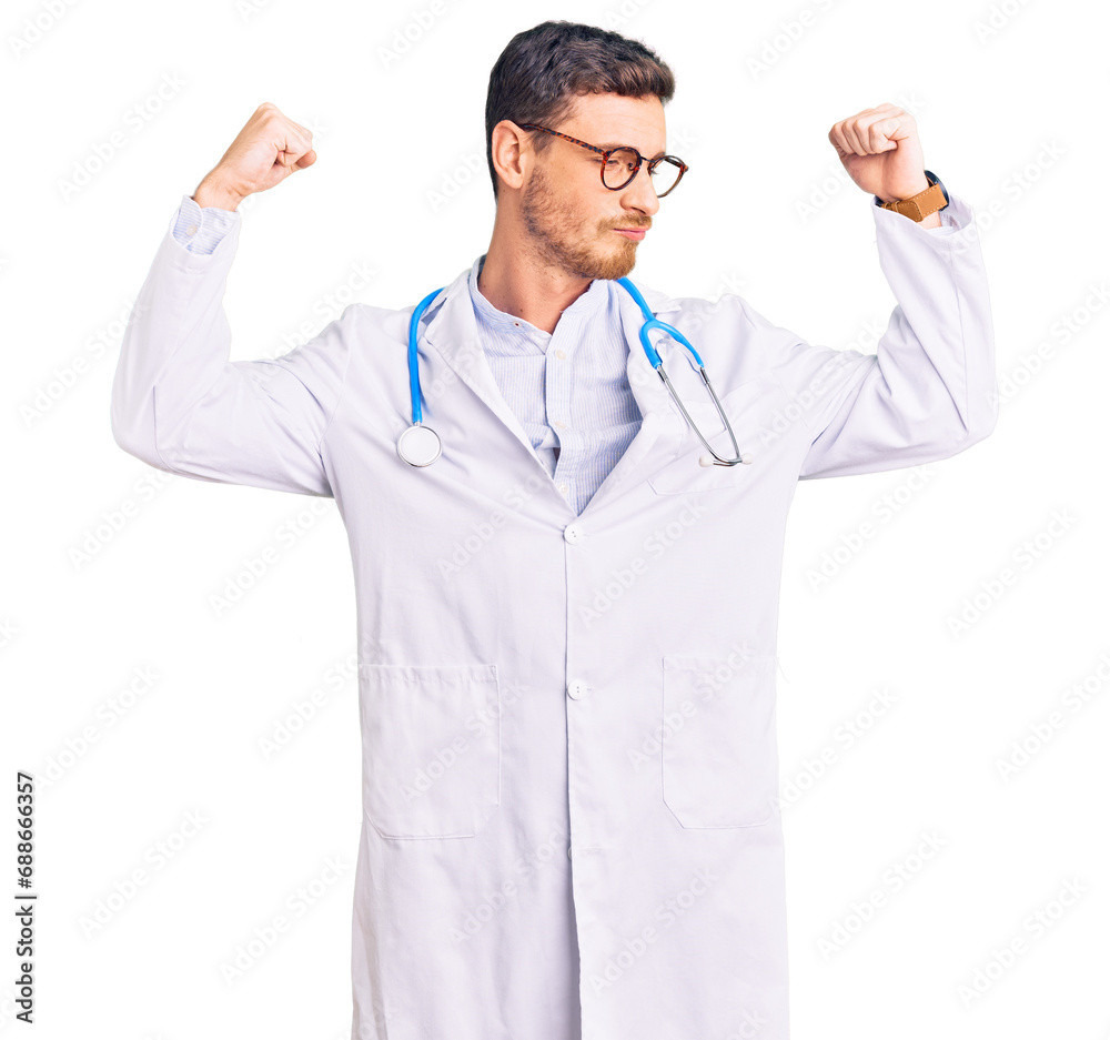 Handsome young man with bear wearing doctor uniform showing arms muscles smiling proud. fitness concept. Handsome young man with bear wearing doctor uniform showing arms muscles smiling proud. fitness concept.