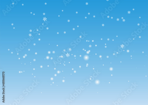 雪が舞い散る冬の空イメージ背景