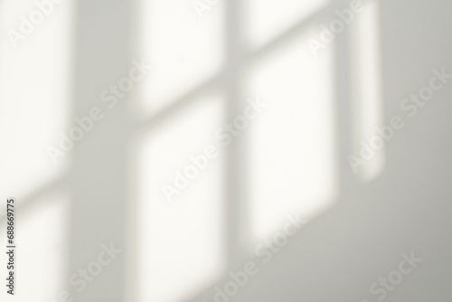 Gray shadow and light blur abstract background on white wall  from window. Dark stripe grey shadows indoor in room  background, monochrome, shadow overlay effect for backdrop and mockup design