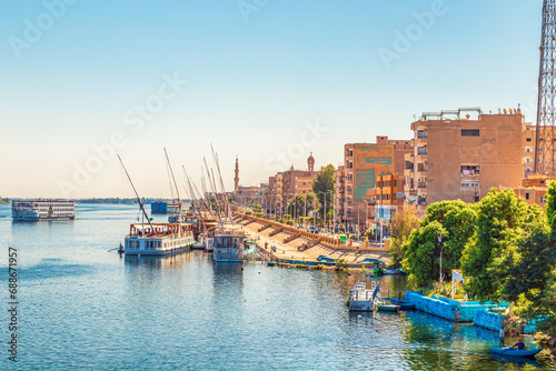 Fotobehang View of the Esna embankment from the Nile River.