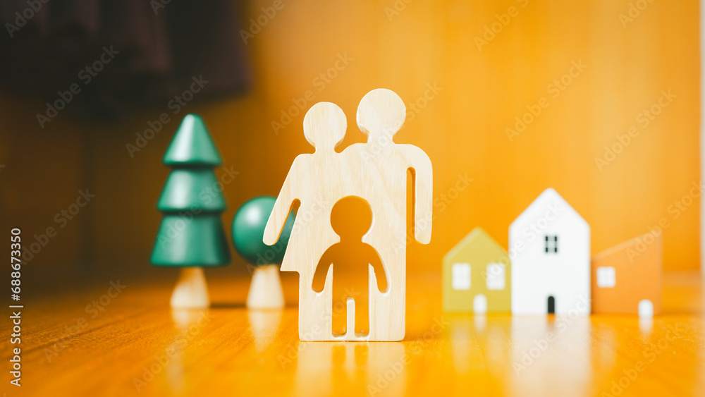 Family model, Security protection and health insurance. The concept of family home, protection, health care day, house insurance. Family model, Security protection and health insurance. The concept of family home, protection, health care day, house insurance.