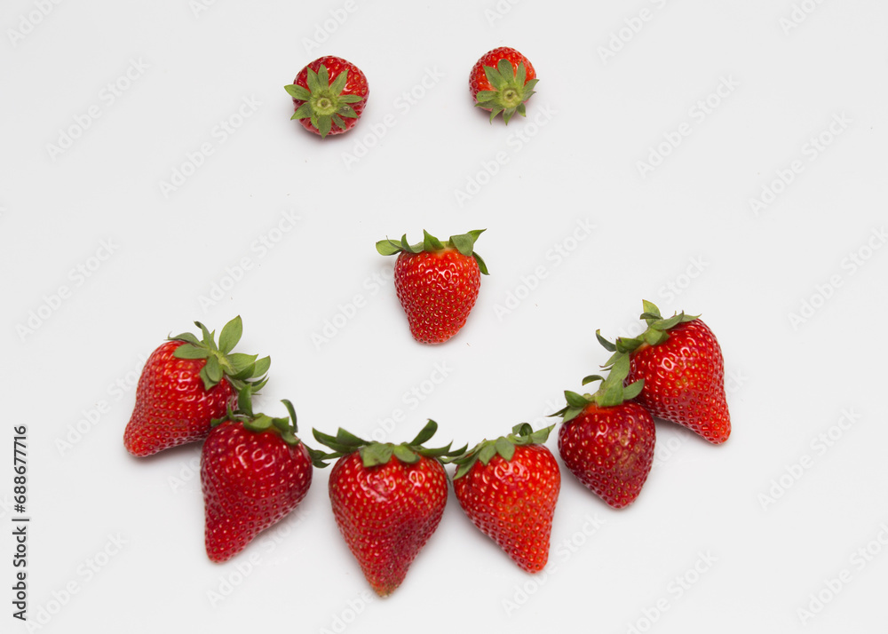 Pile of isolated strawberries in white forest berries. Pile of isolated strawberries in white forest berries.