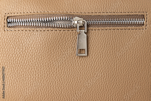 Leather bag and zipper as texture background photo