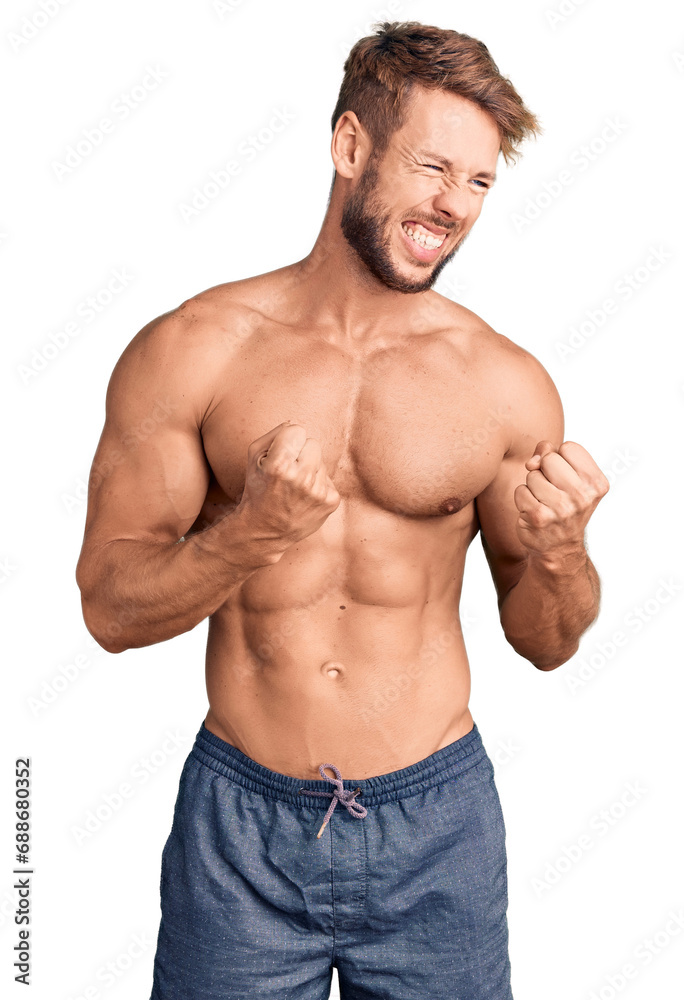 Young caucasian man standing shirtless excited for success with arms raised and eyes closed celebrating victory smiling. winner concept. Young caucasian man standing shirtless excited for success with arms raised and eyes closed celebrating victory smiling. winner concept.