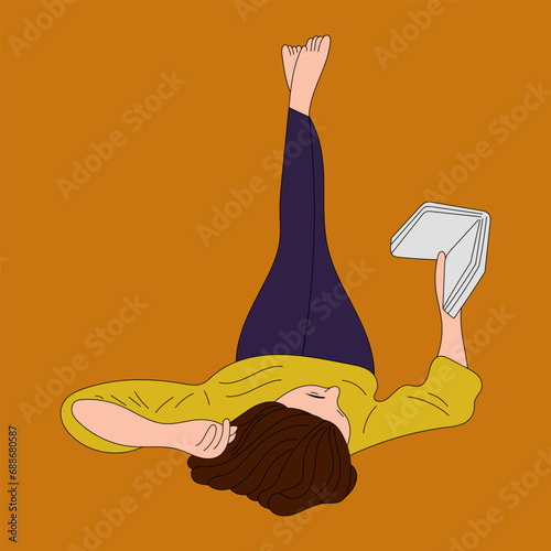 The girl is lying on her back and reading a book
