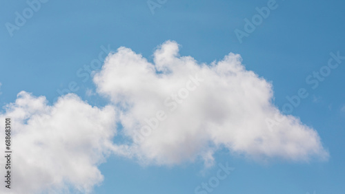 Panoramic background of white clouds with blue sky