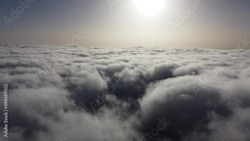 Aerial drone view over the foggy mist on the mountain tops of Madeira photo