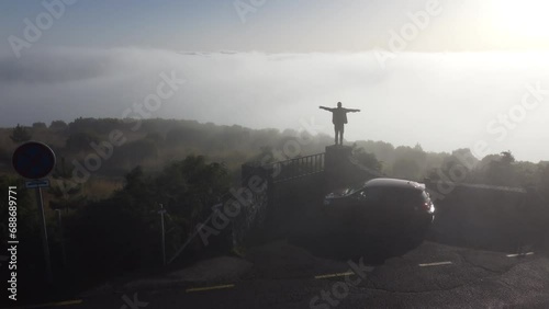 Aerial drone view over the foggy mist on the mountain tops of Madeira photo