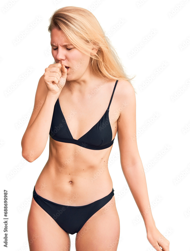 Fototapeta premium Young beautiful blonde woman wearing bikini feeling unwell and coughing as symptom for cold or bronchitis. health care concept.