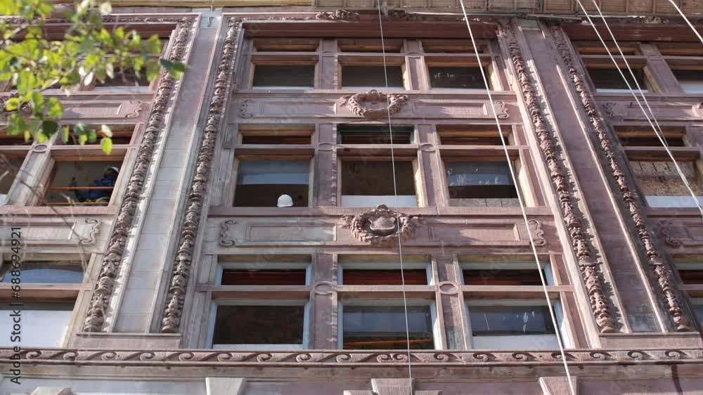Old skyscraper building restoration in Detroit Michigan Old skyscraper building restoration in Detroit Michigan
